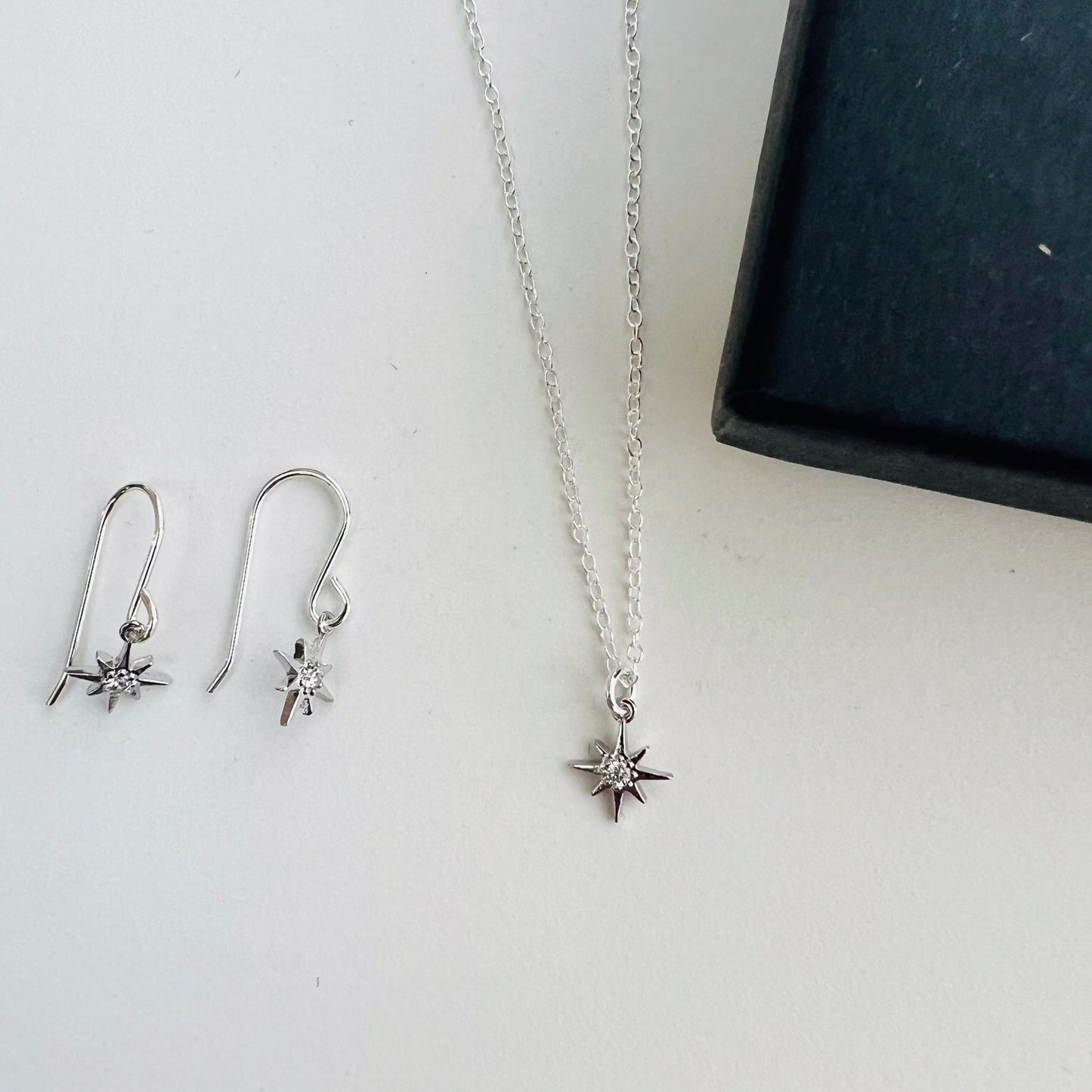 'Lilia' silver star earrings