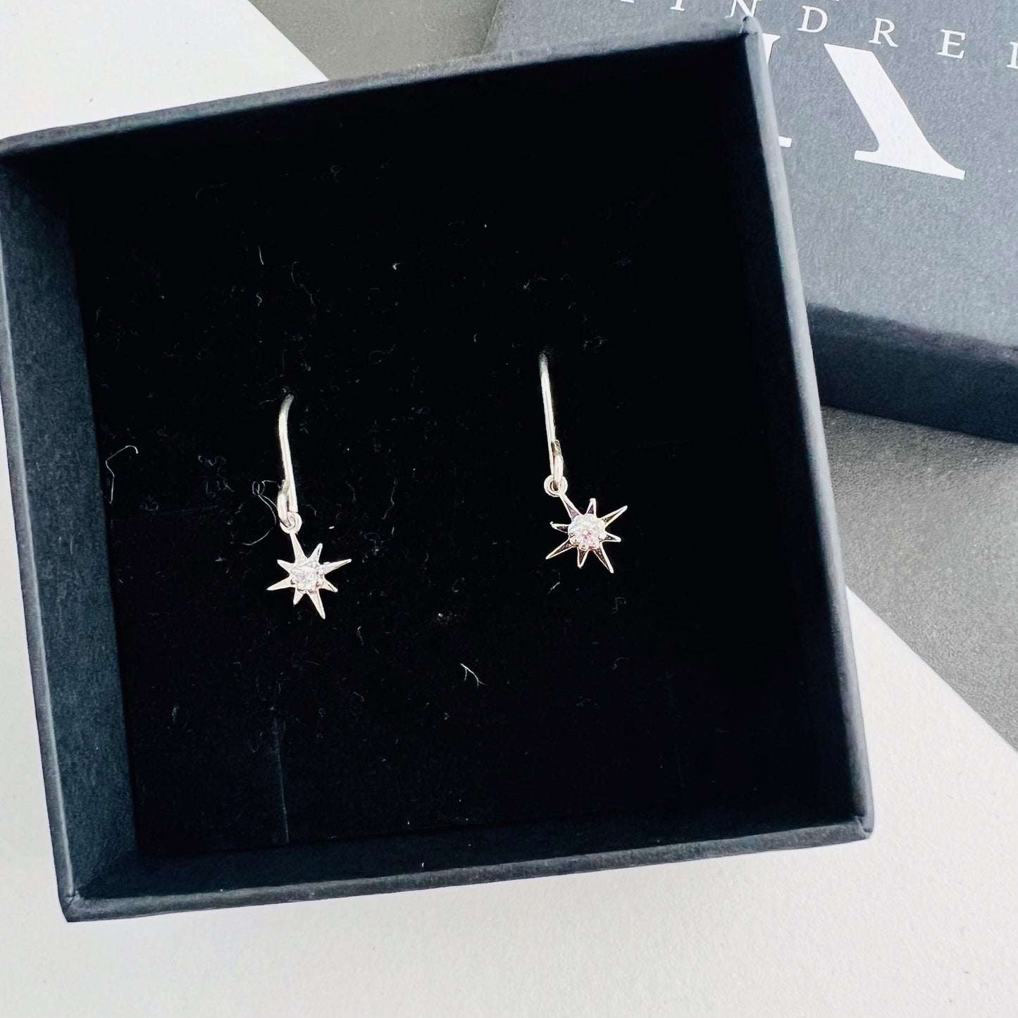 'Lilia' silver star earrings