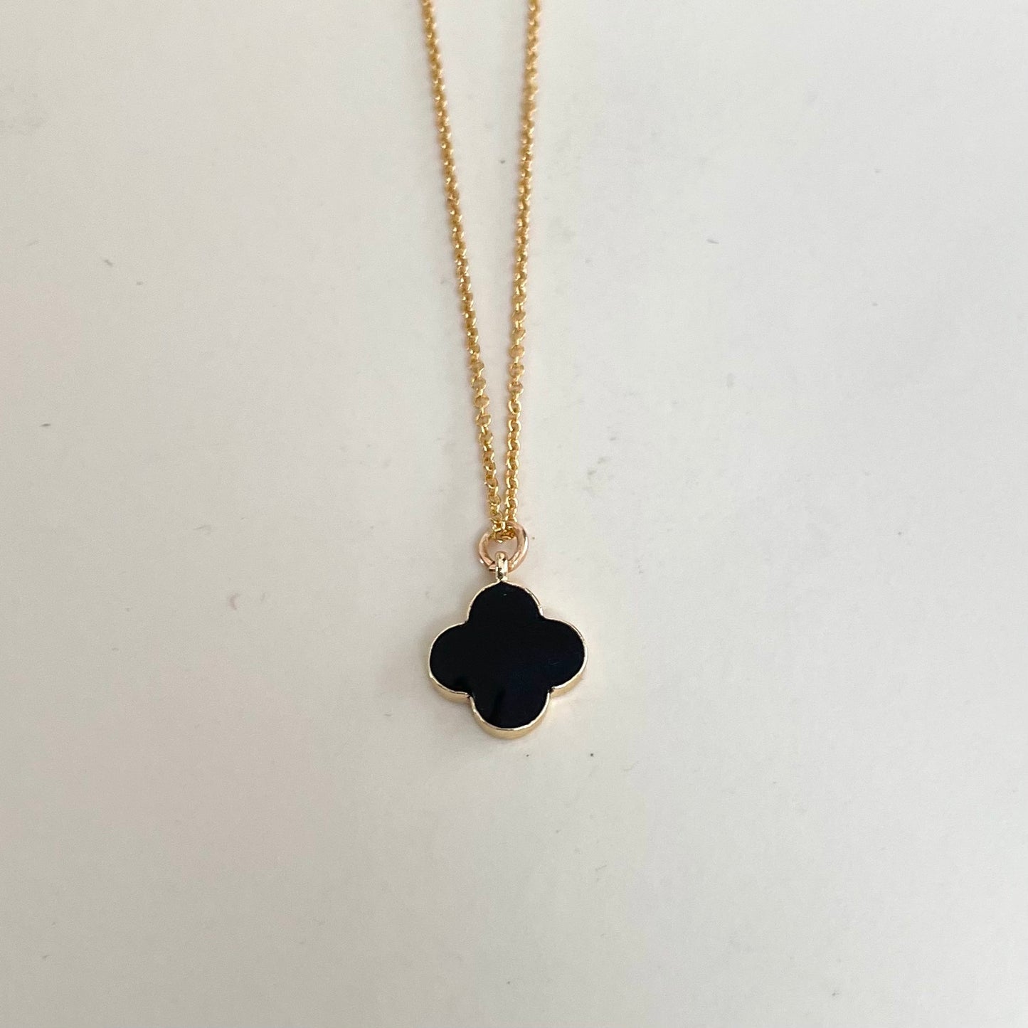 'Monica' black and gold clover necklace