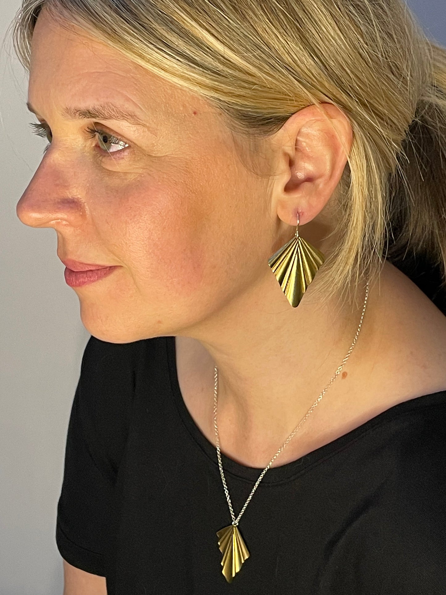 statement brass fan earrings and necklace