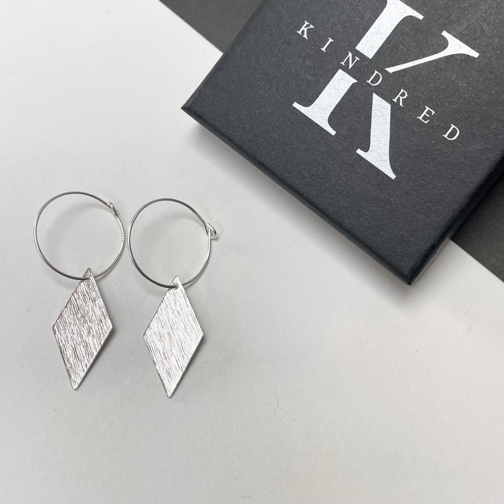 Brushed diamond earrings on sterling silver hoops 