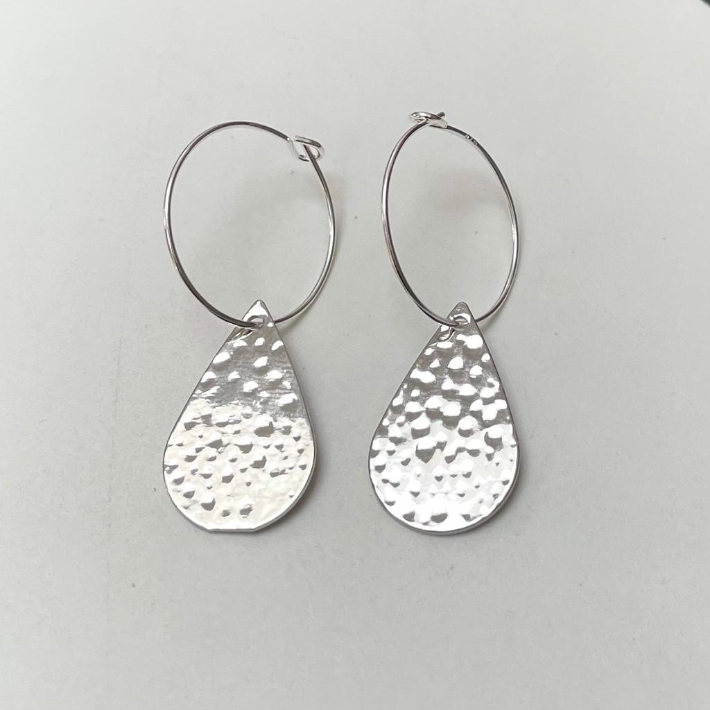 Dimpled petal earrings on silver ear wires